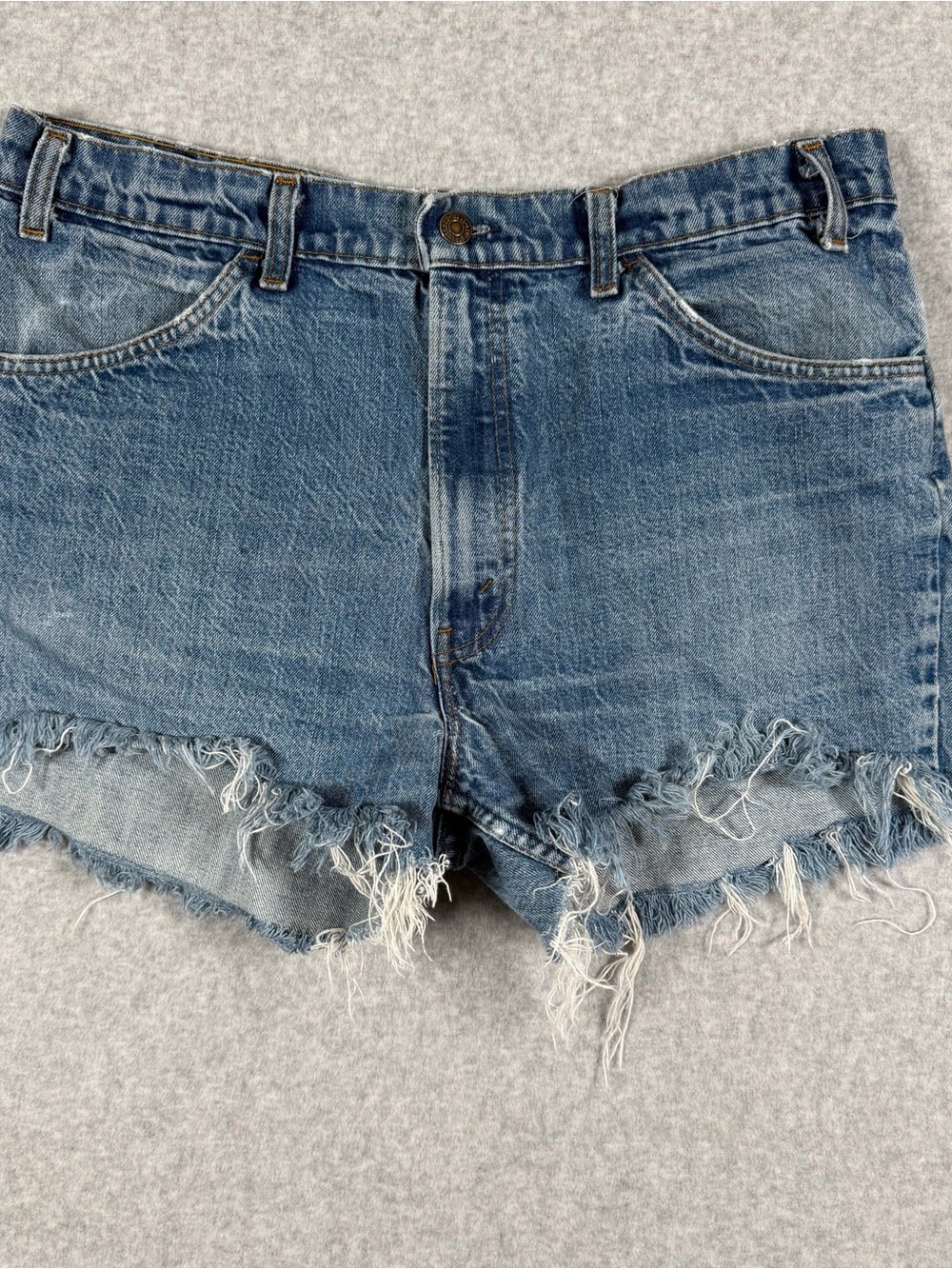Levi's Faded Blue Frayed Hem Denim Cutoff Shorts